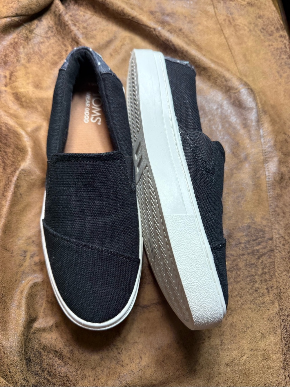68. Toms Black Canvas Slip-On Sneakers with White Sole
